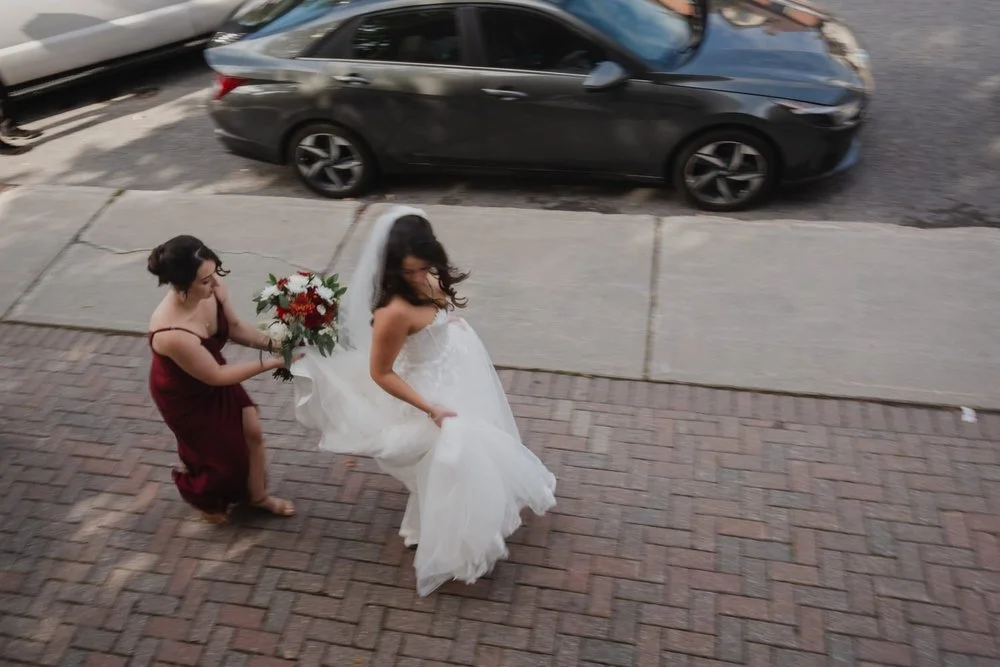photo of a bride walking to her wedding ceremony