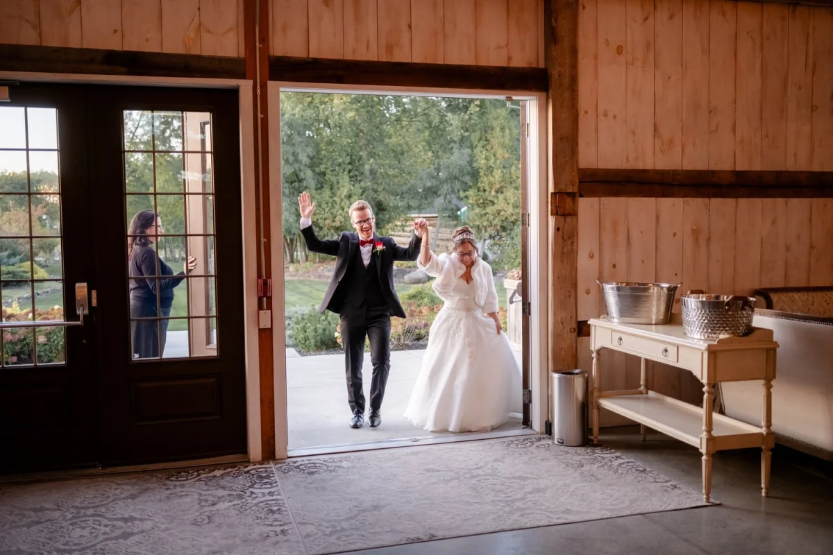 grand entrance of the bride and groom at stonefields