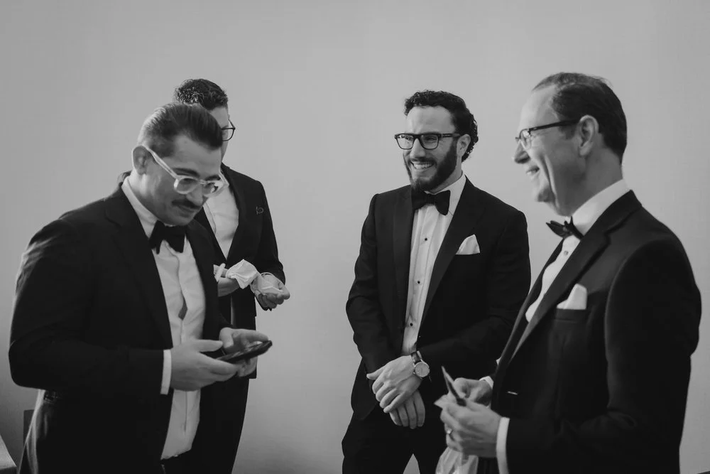 photo of a groom getting ready at the chateau laurier