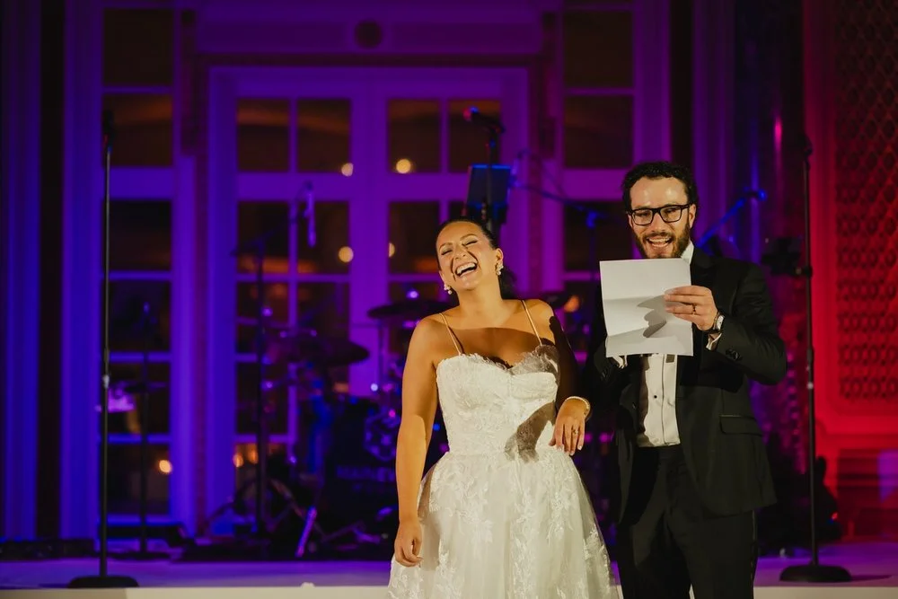 a wedding reception in the candle lit ball room at the chateau laurier