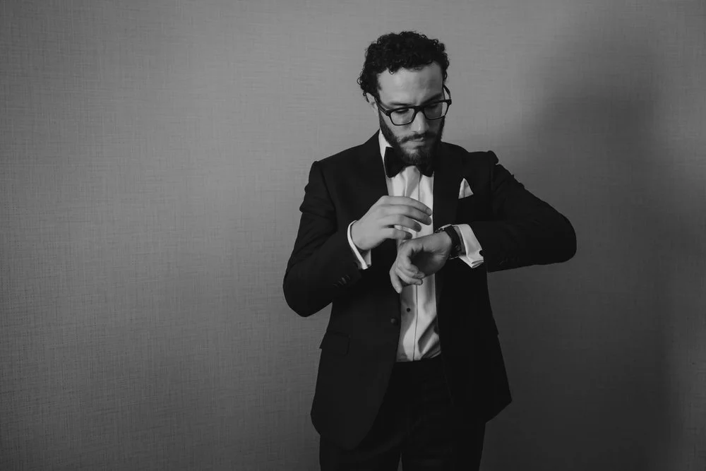 photo of a groom getting ready at the chateau laurier