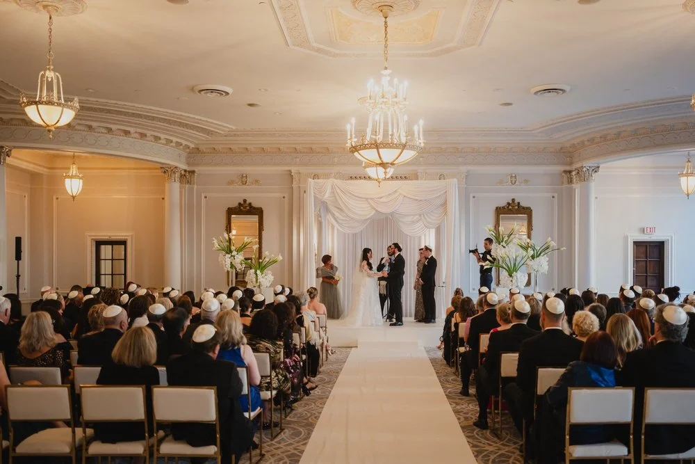photograph from a jewish wedding ceremony in the drawing room at the chateau laurier