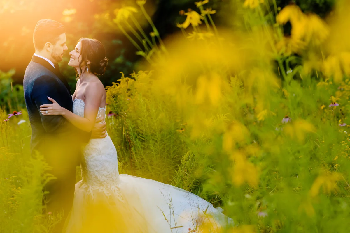 bride and groom sunset portrait at an italian wedding at le belevedere in wakefield quebec