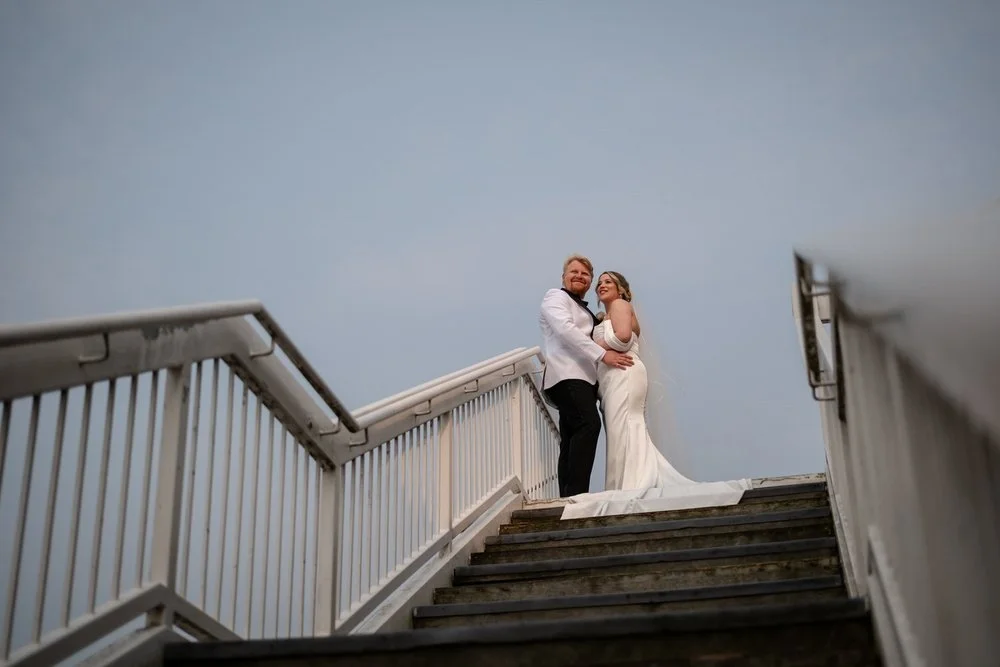photograph of a newly married couple on the terrace at Lago