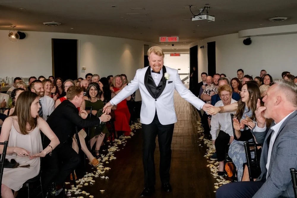 groom walking down the aisle