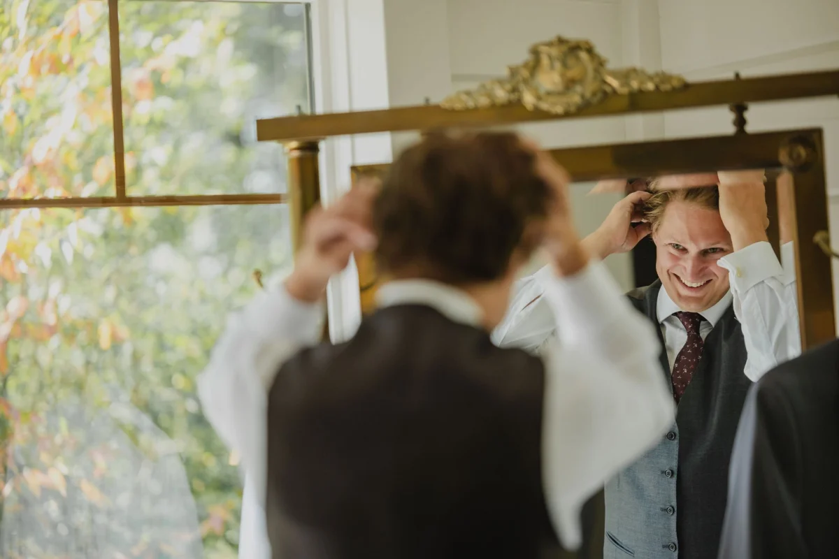 groom getting ready for his wedding at le belvedere