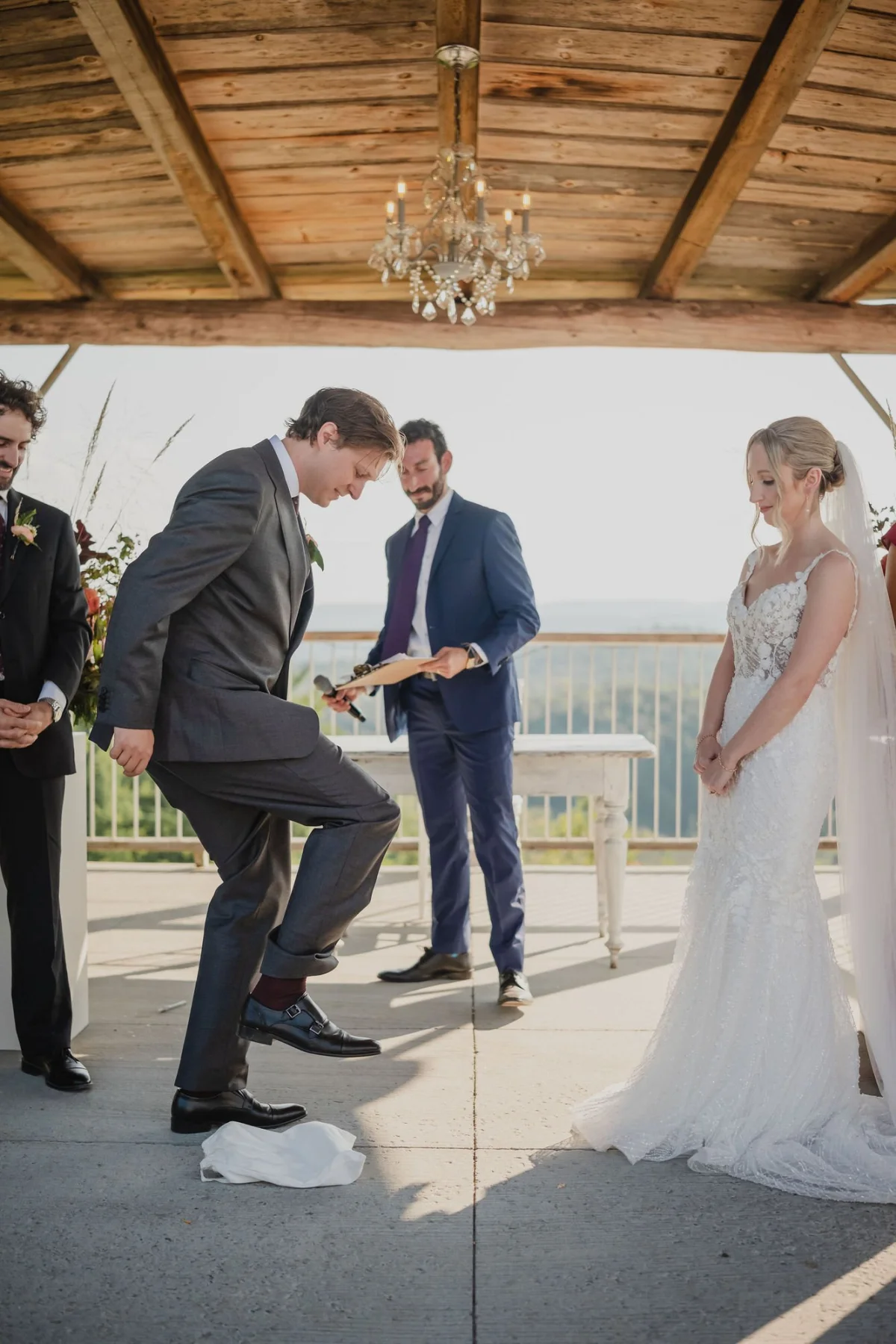 breaking the glass at a jewish wedding ceremony at le belvedere