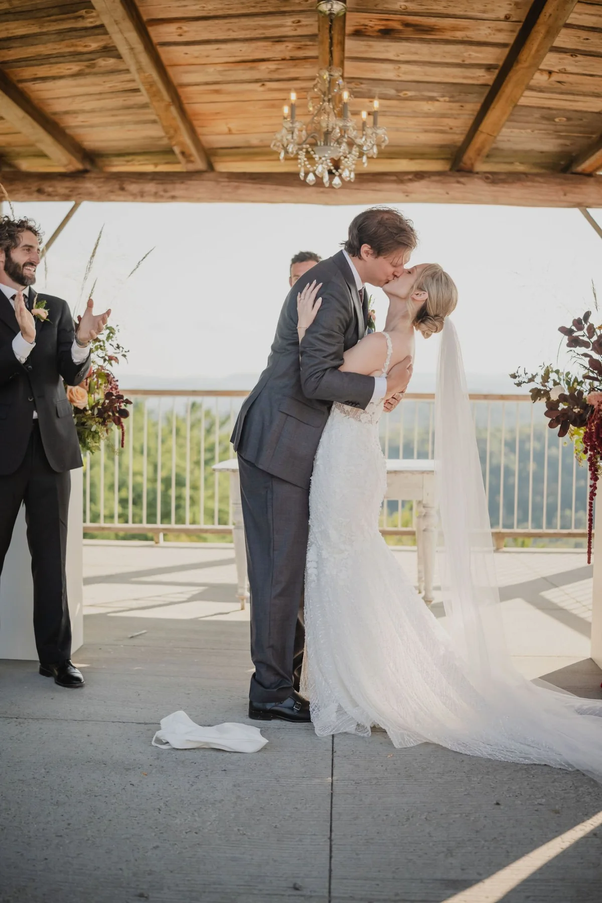 first kiss photograph at a wedding ceremony at le belvedere