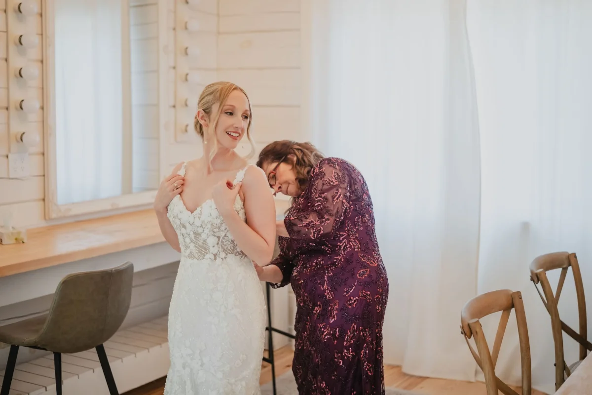 bride and her mother getting ready for a wedding at le belvedere