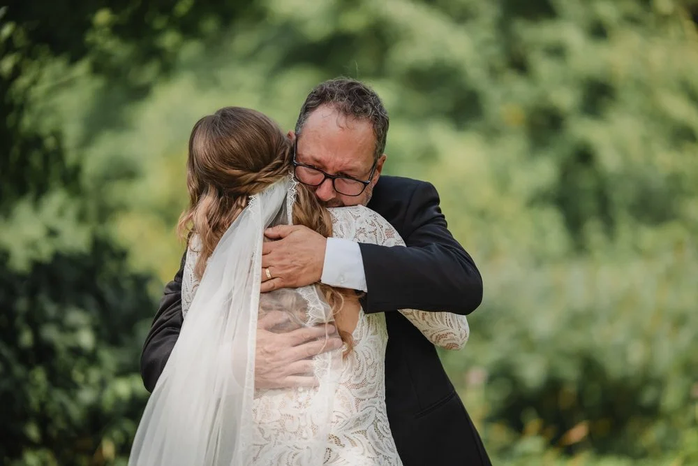 first look photo with a bride and her dad