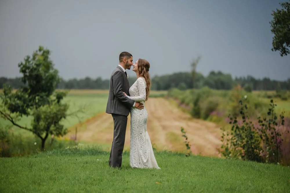 bride and groom photograph around Adelina barn