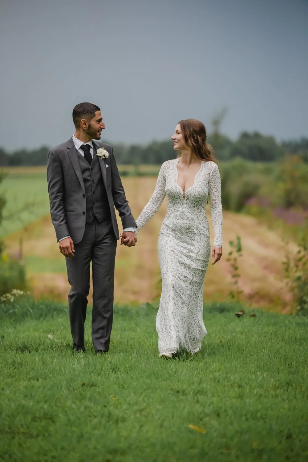 bride and groom photograph around Adelina barn