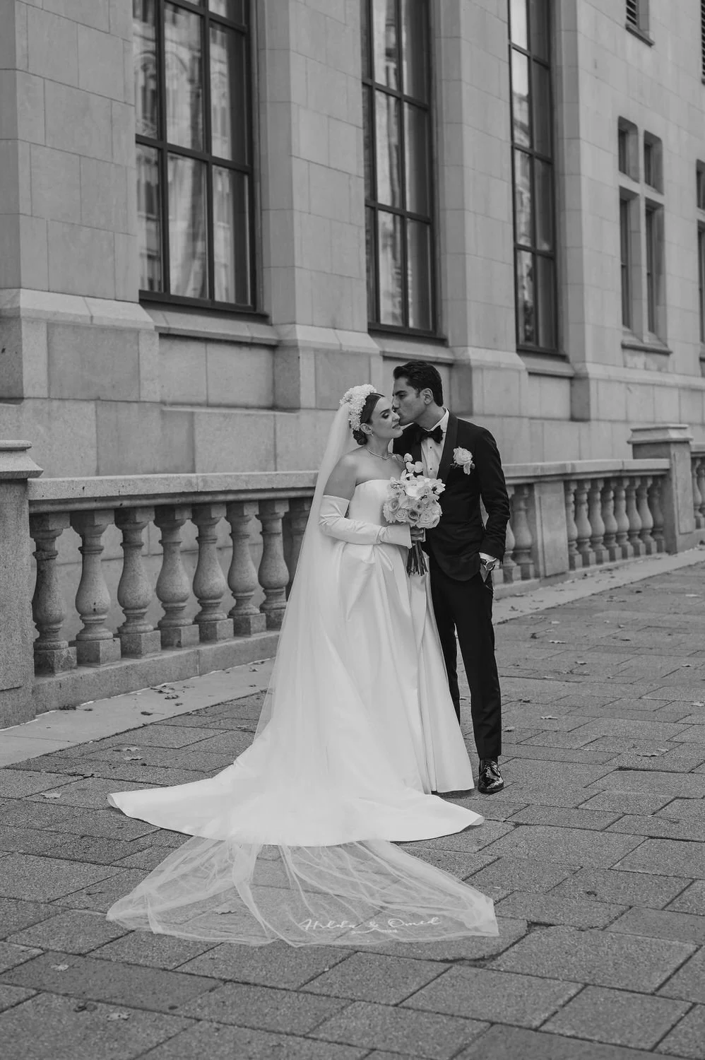wedding photograph of a couple outside the chateau laurier in ottawa
