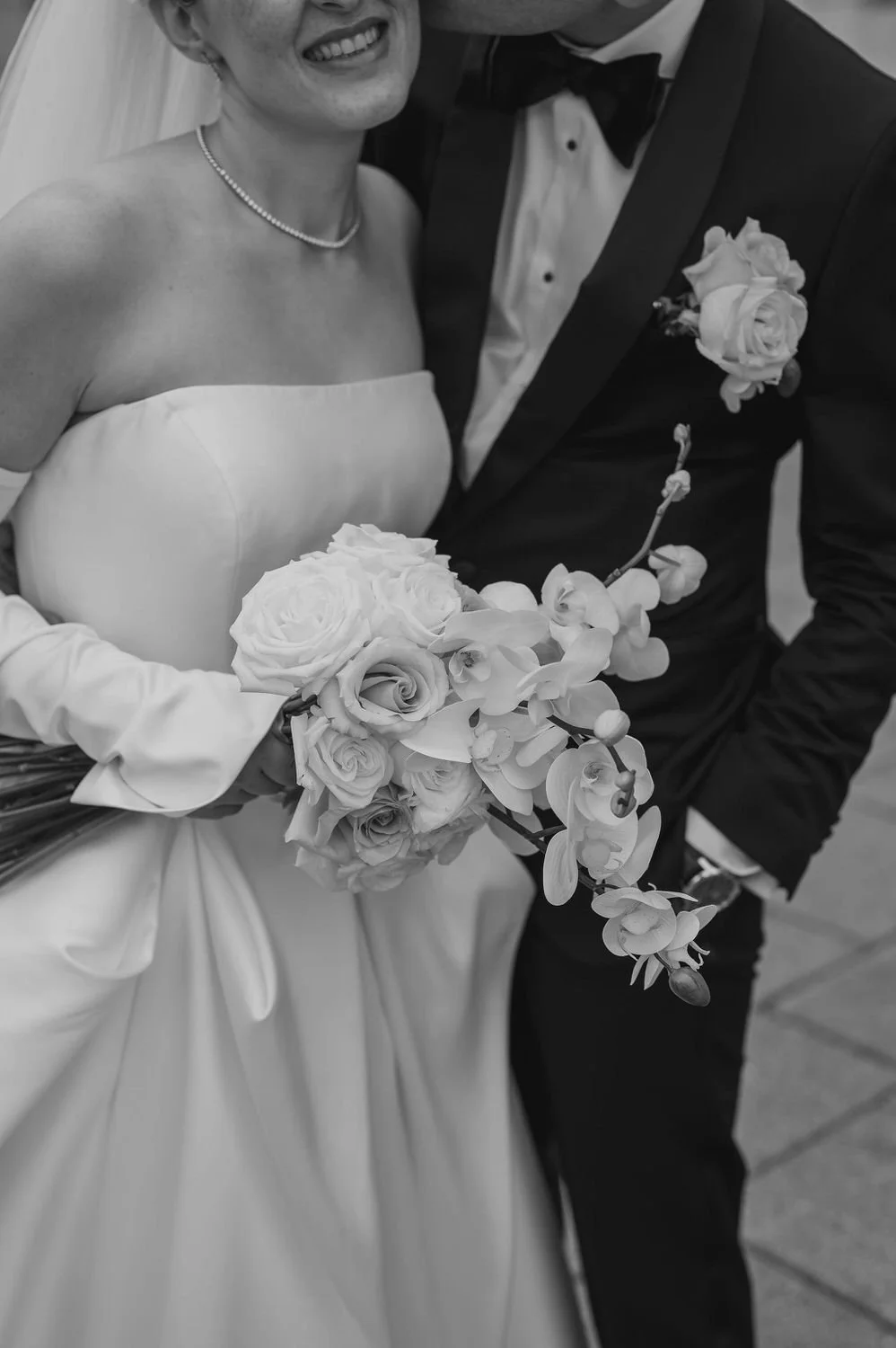 wedding photograph of a couple outside the chateau laurier in ottawa