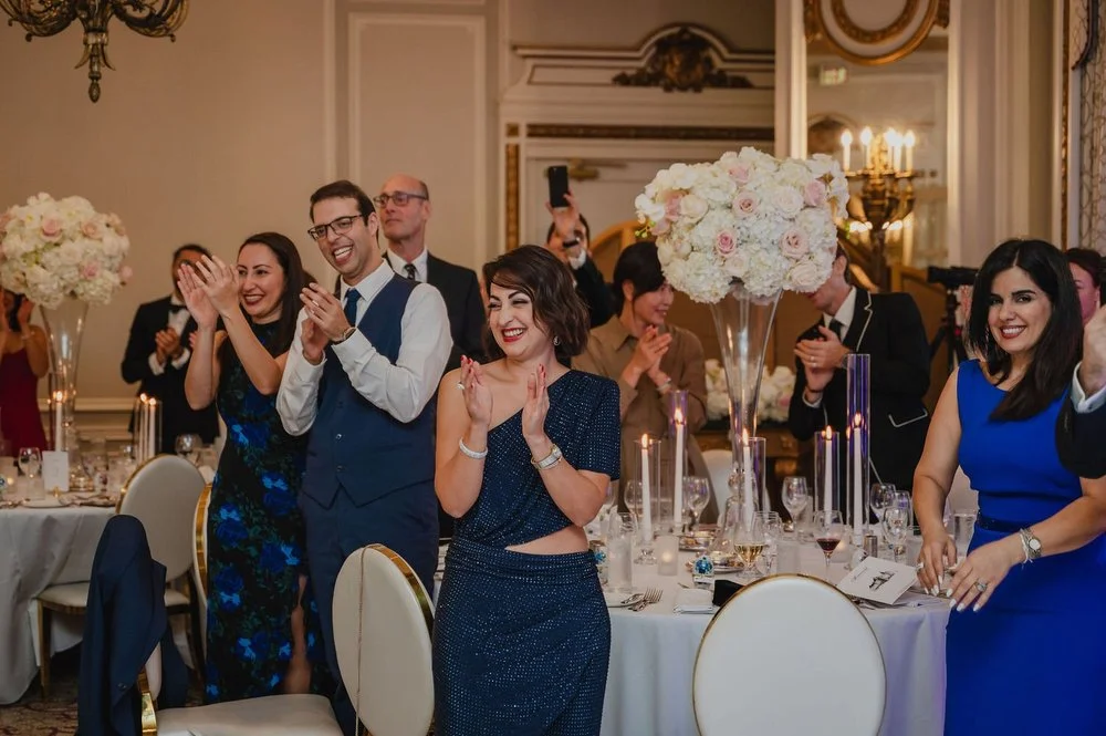 wedding guests cheering