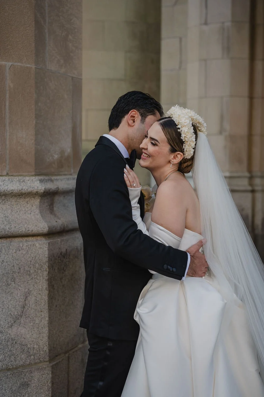 wedding photograph of a couple outside the chateau laurier in ottawa