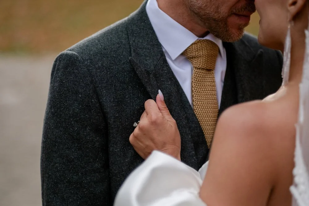 beautiful natural light wedding portraits of an elegant couple at temples sugar bush