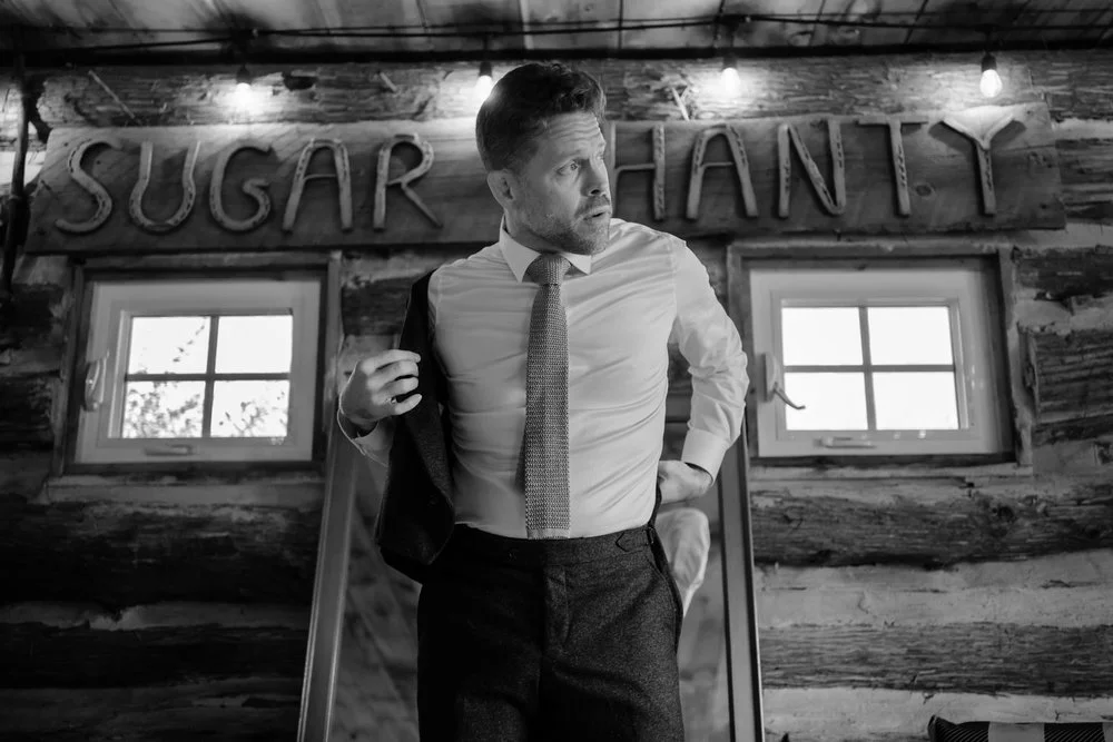 stylish groom getting ready for his wedding