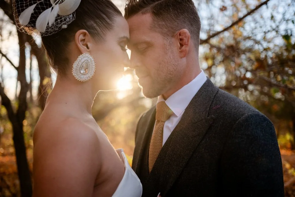 beautiful natural light wedding portraits of an elegant couple at temples sugar bush