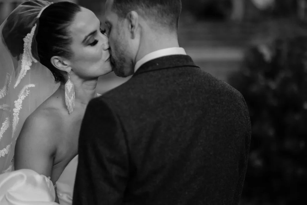 beautiful natural light wedding portraits of an elegant couple at temples sugar bush
