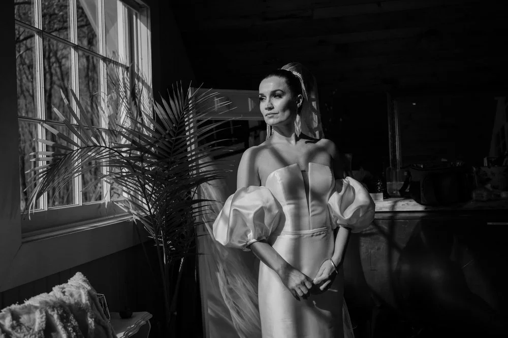 Black and white photograph of an elegant bride at Temple's Sugar Bush