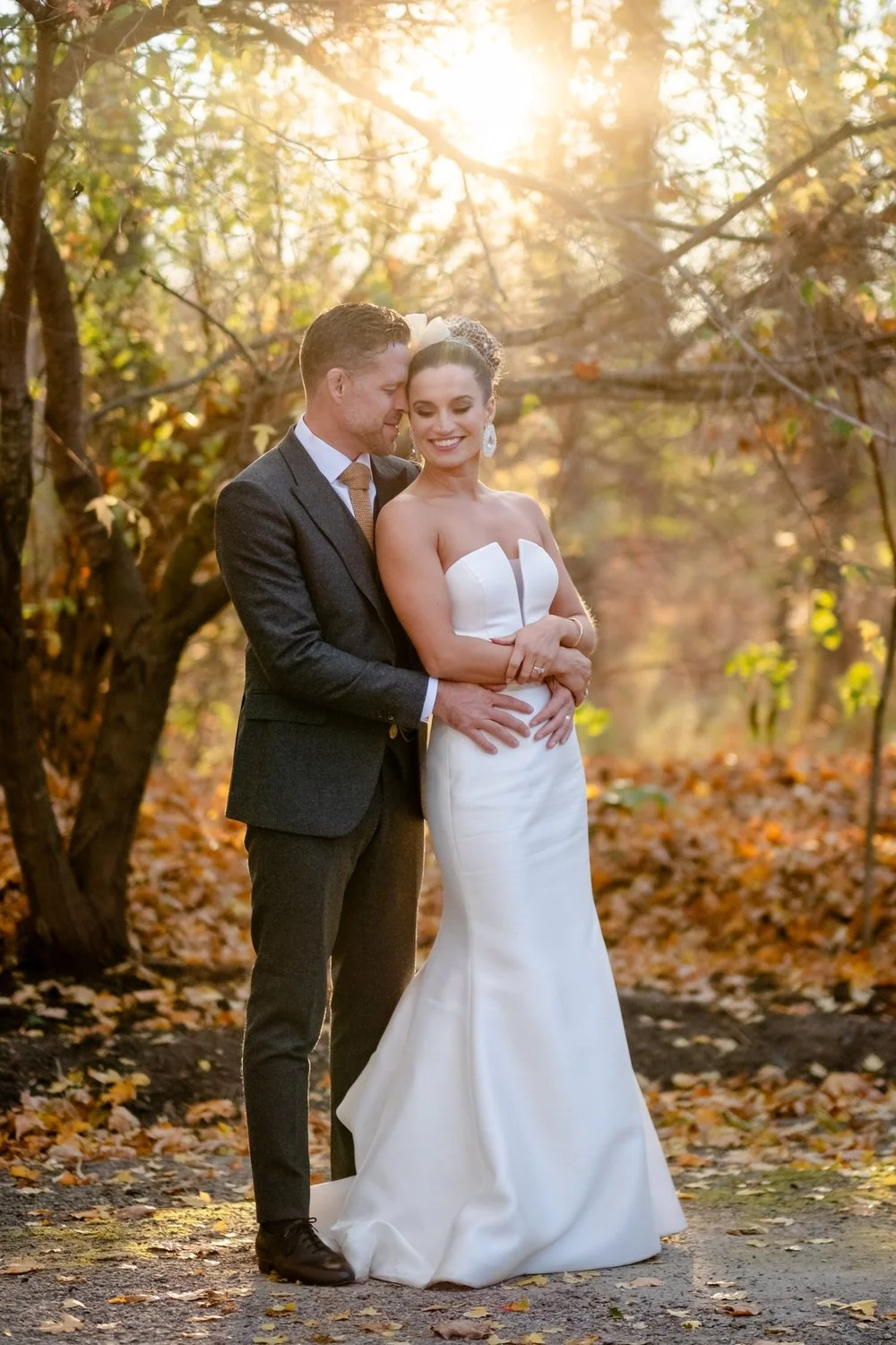 beautiful natural light wedding portraits of an elegant couple at temples sugar bush