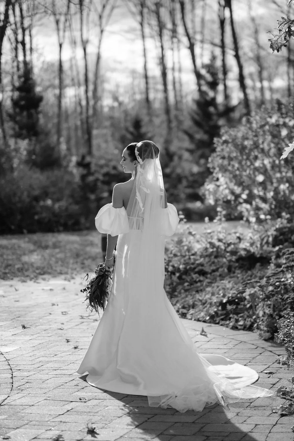 black and white wedding photograph at autumn wedding ceremony photograph at Temple's Sugar Bush