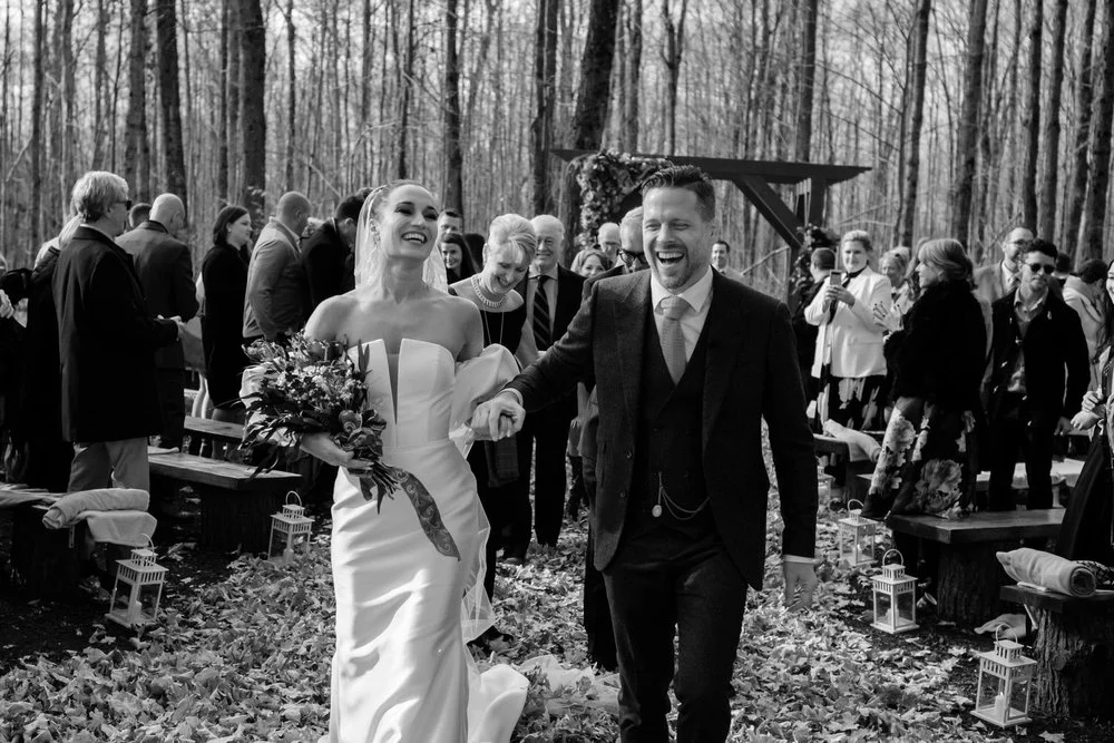 black and white wedding photograph at autumn wedding ceremony photograph at Temple's Sugar Bush