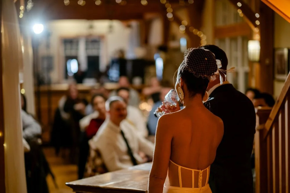 bride and groom giving a speech at temples sugar bush