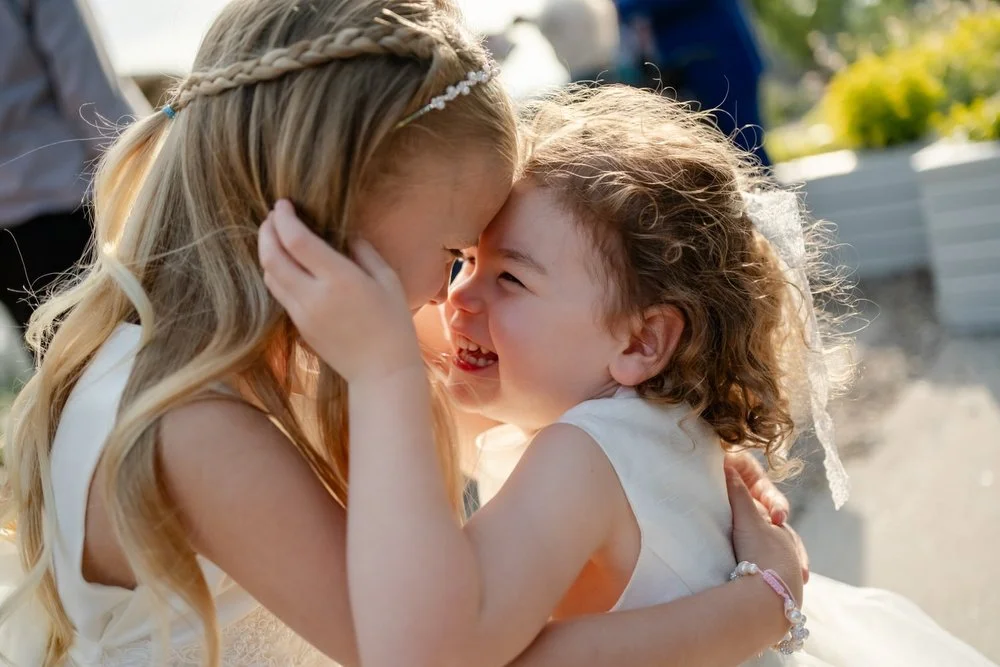 photo of kids playing at a wedding