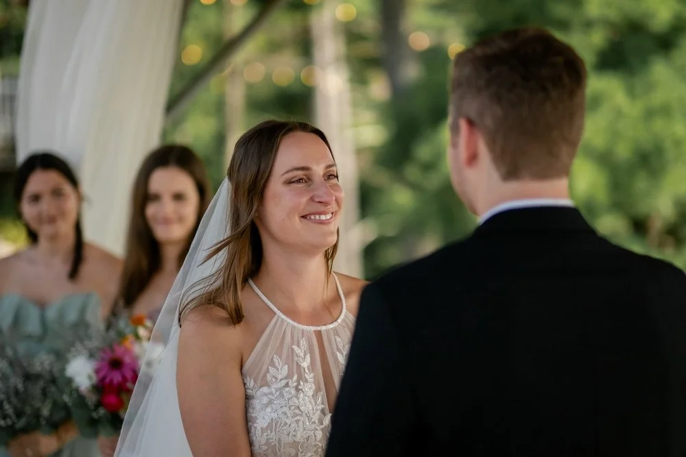 smiling bride at her outdoor wedding ceremony