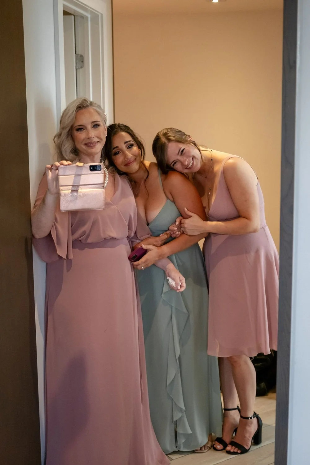 bridesmaids crying witnessing an emotional moment at a wedding