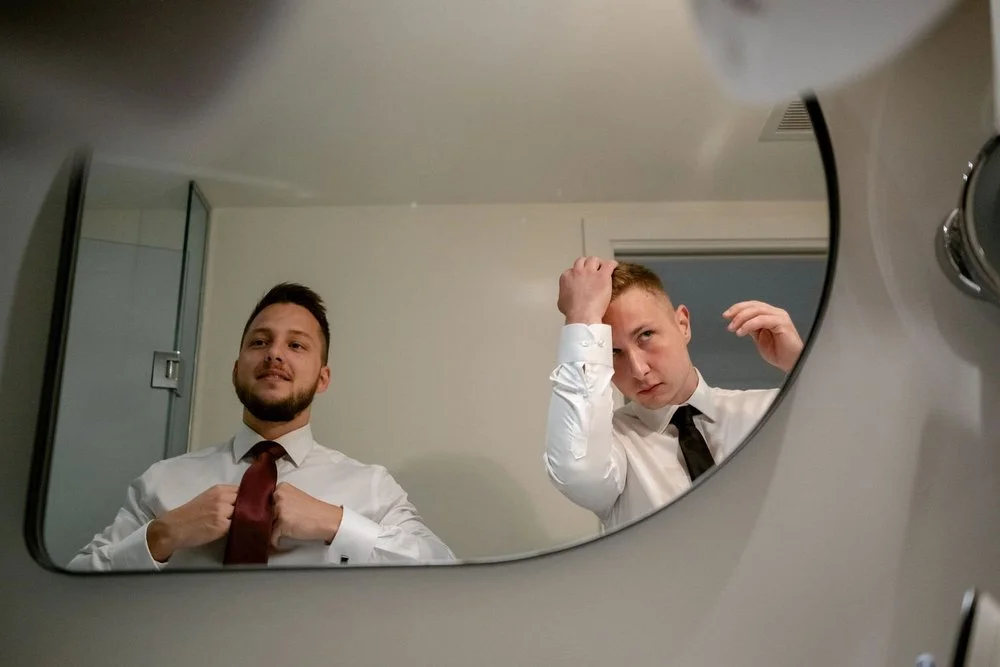 Groom and groomsmen getting ready for a wedding at the Andaz Hotel