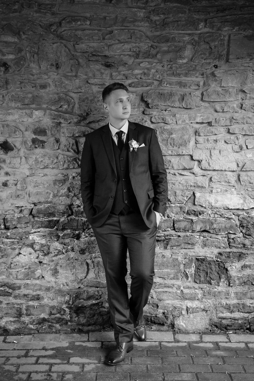 wedding portraits of a groom in downtown ottawa