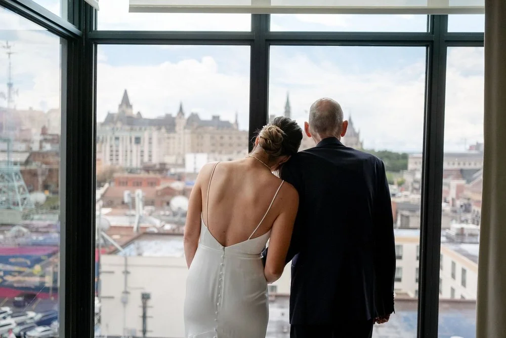 emotional moment between a bride and her father on her wedding day