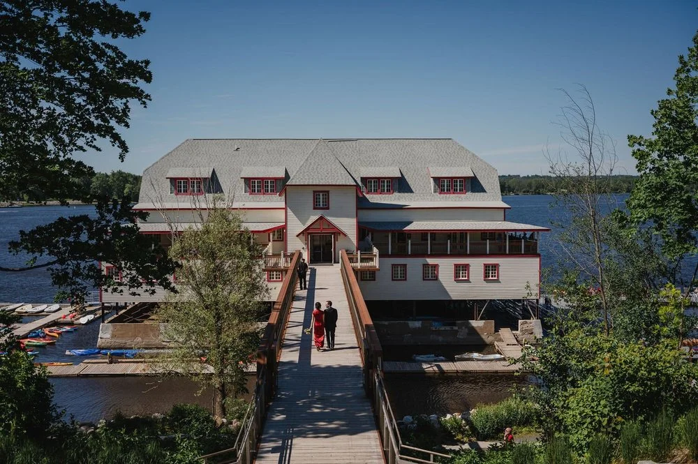 a couple arrives at the NCC River House for their wedding