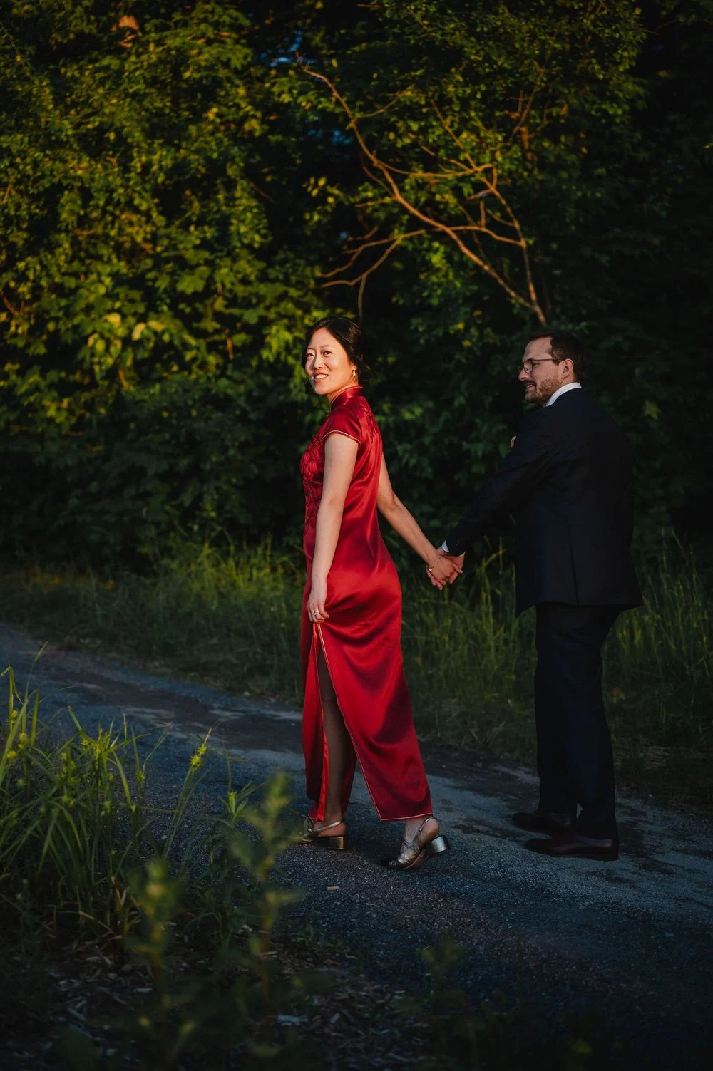a bride and groom portrait outside the wedding photographs outside the NCC River House at sunset in Ottawa
