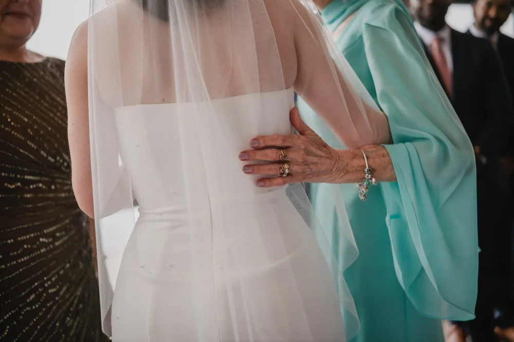 a touching moment between a bride and her grandmother