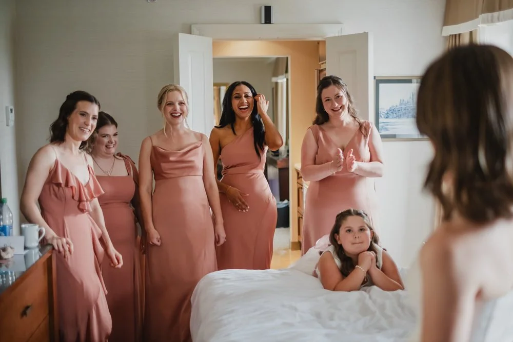 first look with bridesmaids and bride