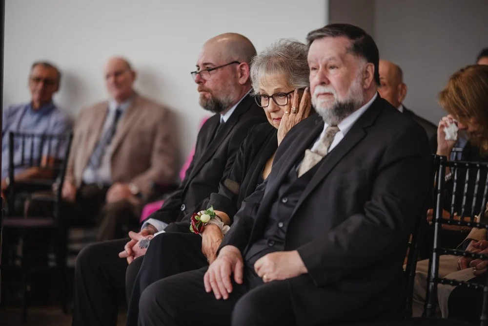 photograph of parents of the bride and groom at a Lago in ottawa