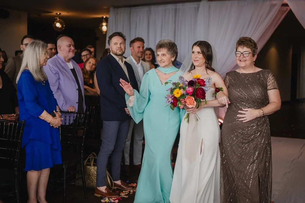 photograph of a bride walking down the aisle at Lago in ottawa
