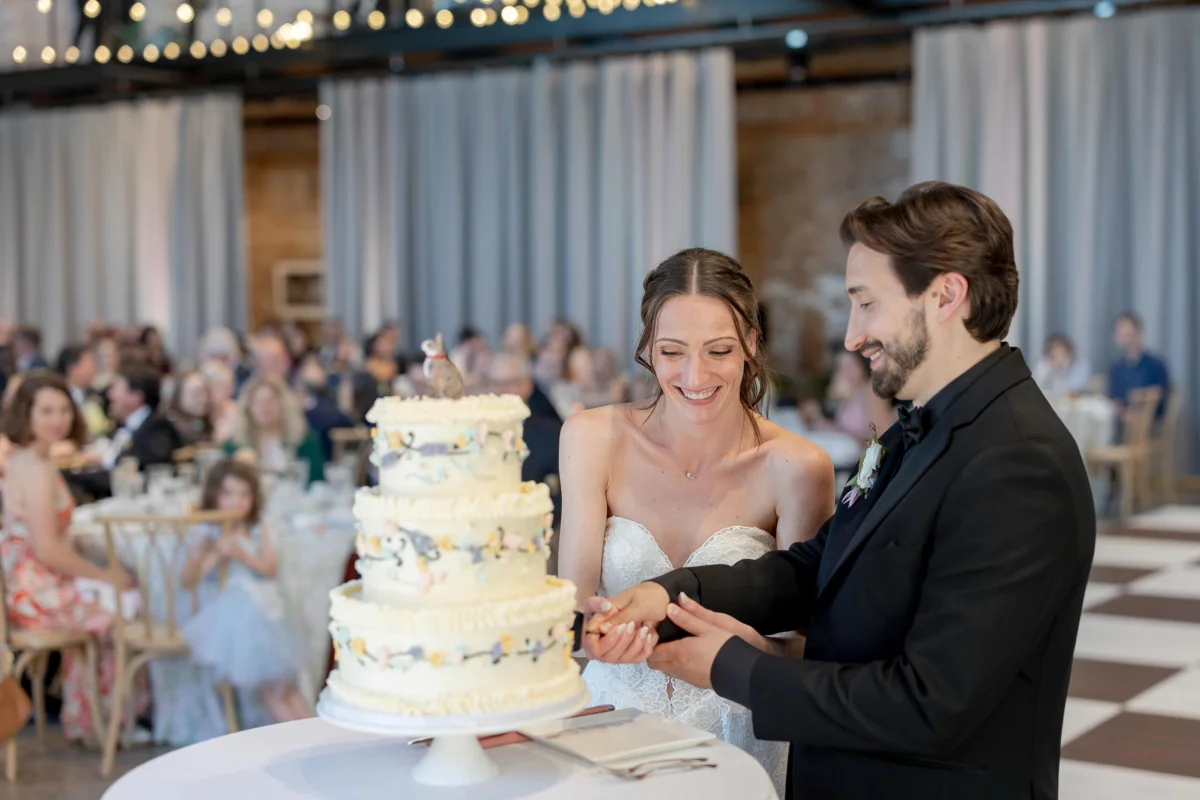 spring-wedding-garver-feed-mill-cake-cutting