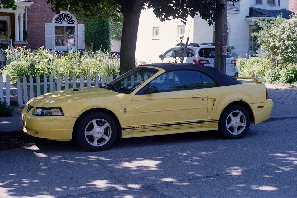 Yellow Mustang Convertable July 2026