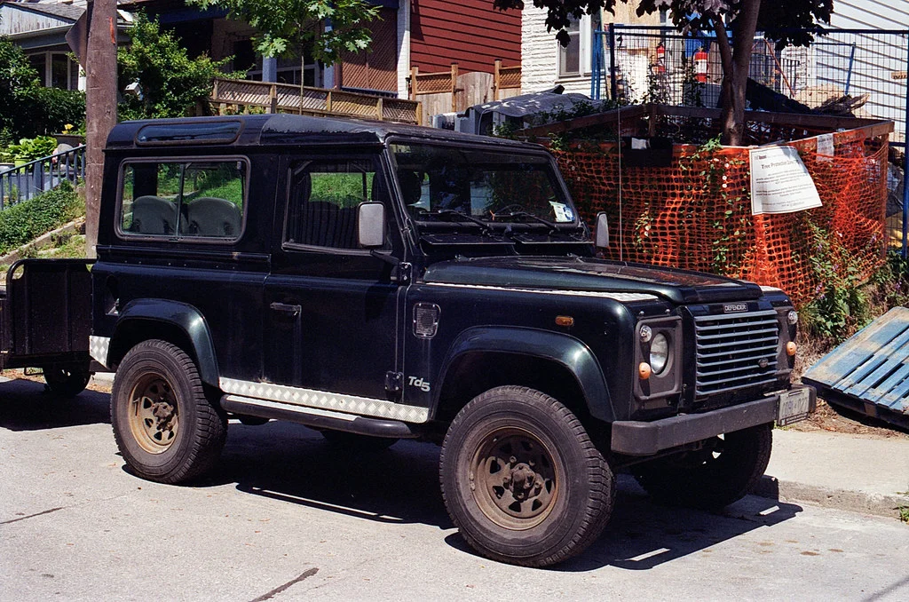 Dark Green Defender July 2026